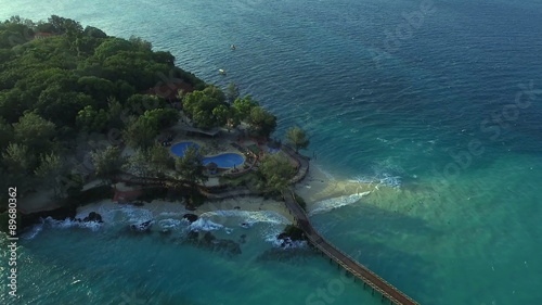 Aerial view Flying camera over Beach coast. Africa. Tanzania. Zanzibar. Travel tourism adventure in Resort camera bird eye view.