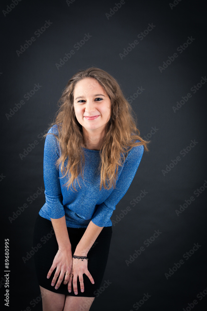 Beautiful woman doing different expressions in different sets of clothes: love Beautiful woman doing different expressions in different sets of clothes: love