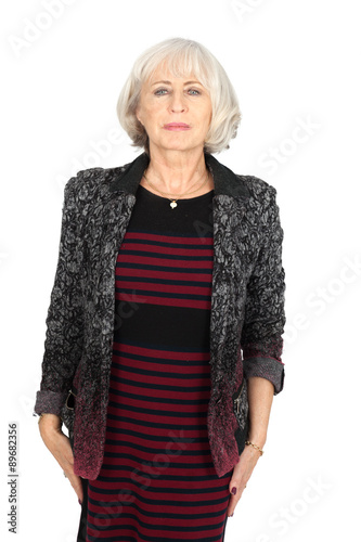 Beautiful woman doing different expressions in different sets of clothes: at attention