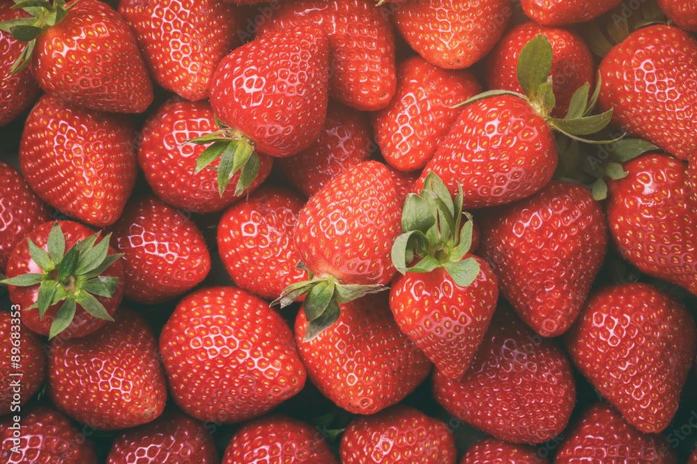 top view of freshly harvested strawberries top view of freshly harvested strawberries