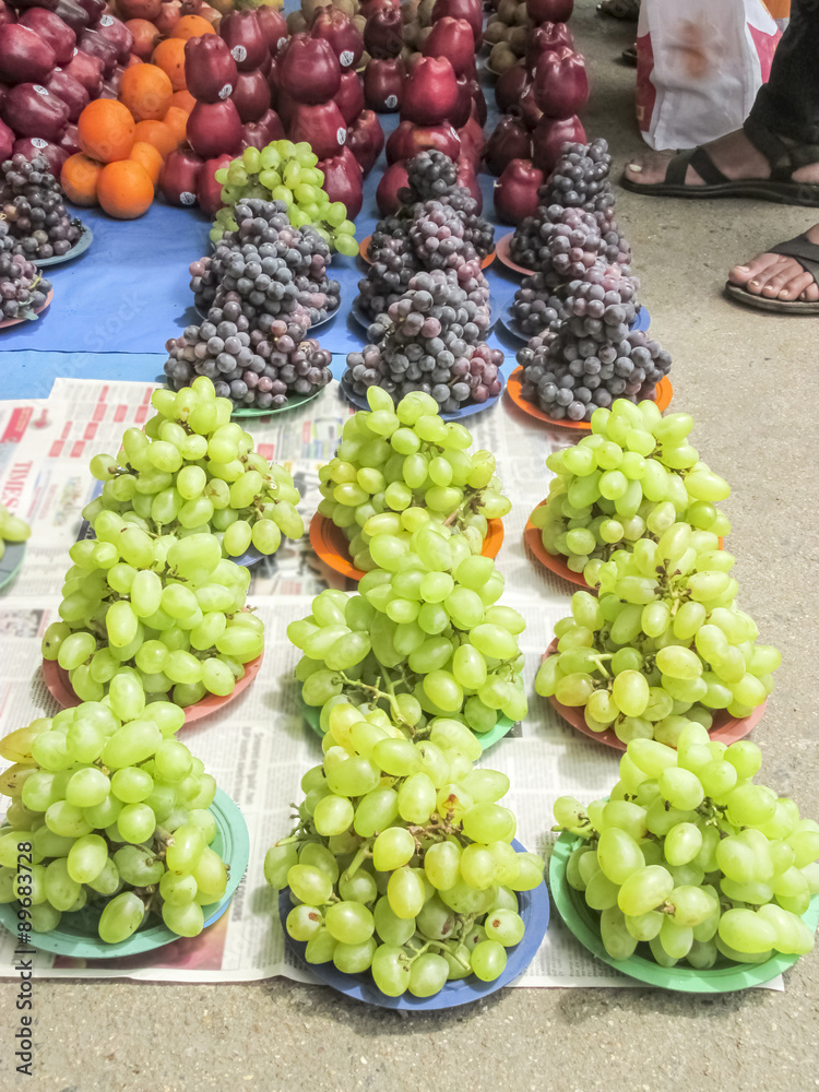 Market place selling of fruits arraneged in pattern Market place selling of fruits arraneged in pattern