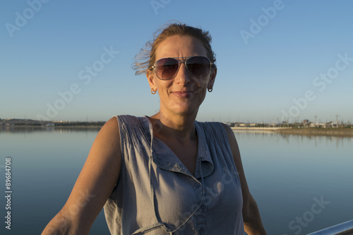 middle-aged woman in sunglasses