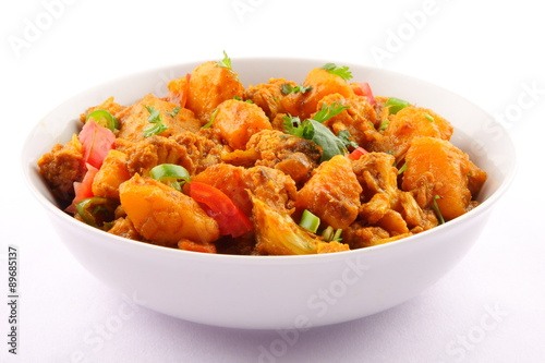 Tradirional North Indian vegetable curry dish -Aloo Gobi,with potatoes and cauliflower photo