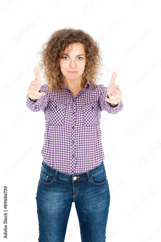 Beautiful Hispanic woman doing different expressions in different sets of clothes: gun sign Beautiful Hispanic woman doing different expressions in different sets of clothes: gun sign