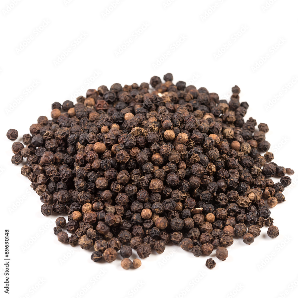 Black pepper was placed on a white background Black pepper was placed on a white background
