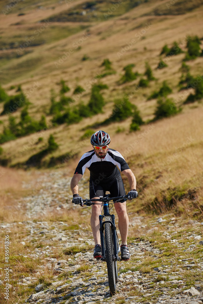 Mountain biker on trails