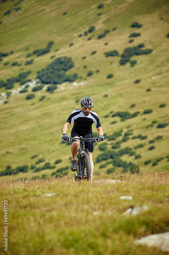 Fototapeta Naklejka Na Ścianę i Meble -  Mountain biker on trails