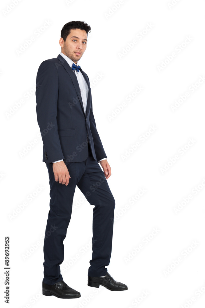 Handsome man doing different expressions in different sets of clothes: full length posing Handsome man doing different expressions in different sets of clothes: full length posing