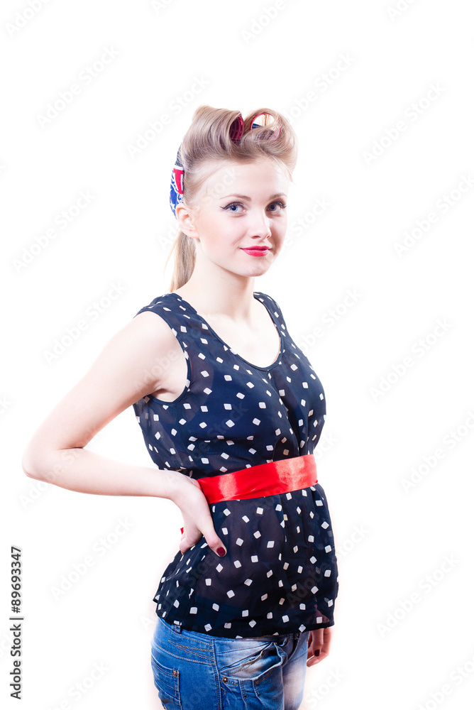 Stylish picture of young blond girl with hair curlers in polka Stylish picture of young blond girl with hair curlers in polka