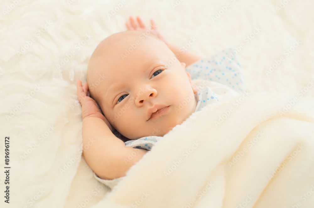 Portrait of sleep infant on the bed at home Portrait of sleep infant on the bed at home