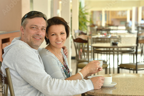 Happy couple with coffee