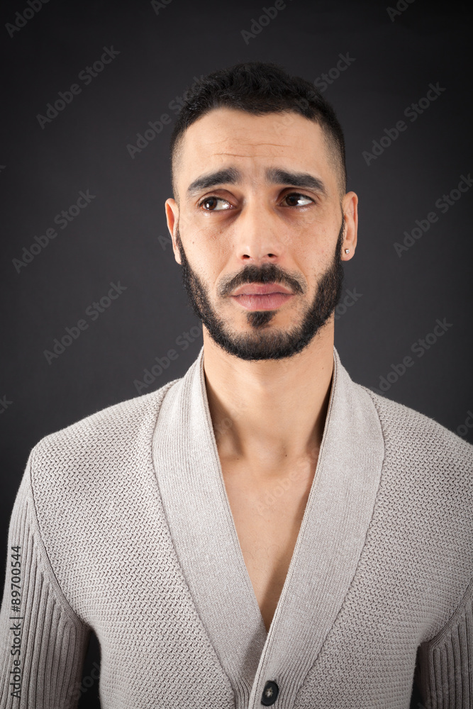 Handsome man doing different expressions in different sets of clothes: thinking Handsome man doing different expressions in different sets of clothes: thinking