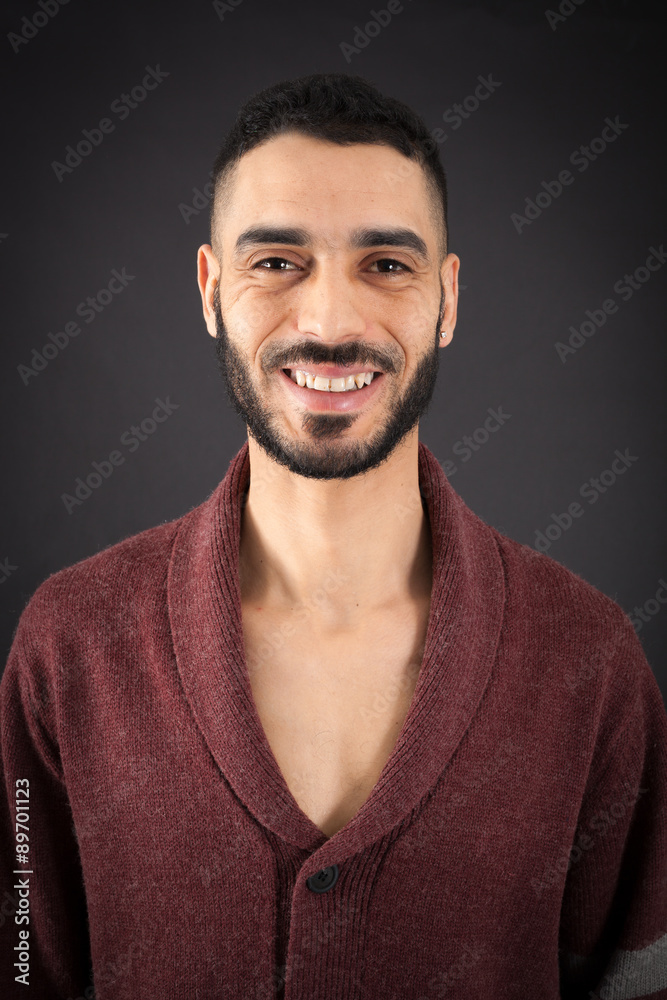 Handsome man doing different expressions in different sets of clothes: smile Handsome man doing different expressions in different sets of clothes: smile