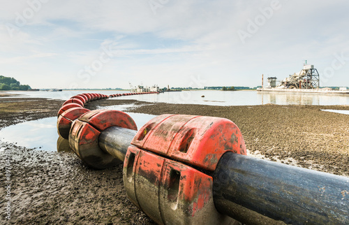 Floating suction dredge in a Dutch river photo