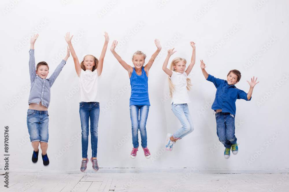 Group of happy young people jumping on white background Group of happy young people jumping on white background