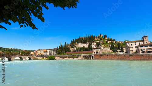 Hill and Ponte Pietra - Verona Italy / Ponte Pietra (Stone bridge) - 1st century B.C. and views of the hills north of Verona with the famous roman theater. Verona, Veneto, Italy