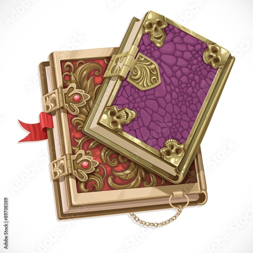 Antique books on witchcraft clasps top view isolated on white ba
