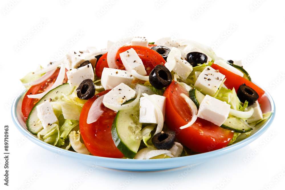 Greek salad on white background