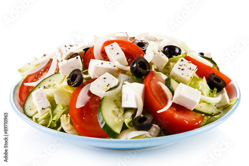 Greek salad on white background