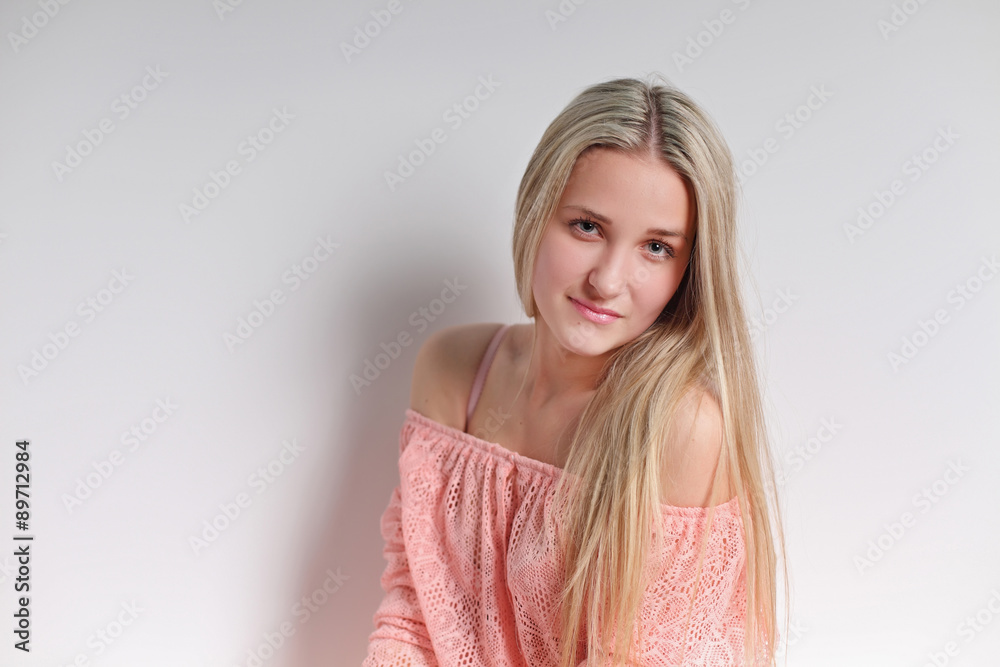 Sensual blonde woman with shiny curly silky hair in elegant dres Sensual blonde woman with shiny curly silky hair in elegant dres