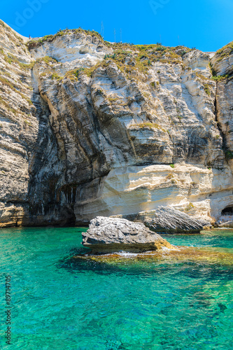 Crystal clear sea water and white cliff rocks near Bonifacio town, Corsica island, France © pkazmierczak