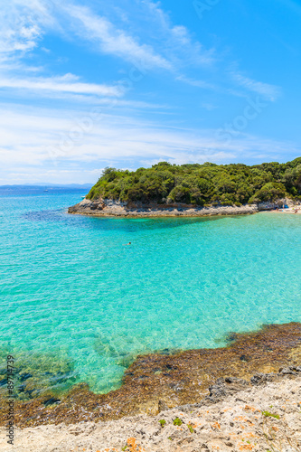 Turquoise sea water of Petit Sperone bay, Corsica island, France © pkazmierczak