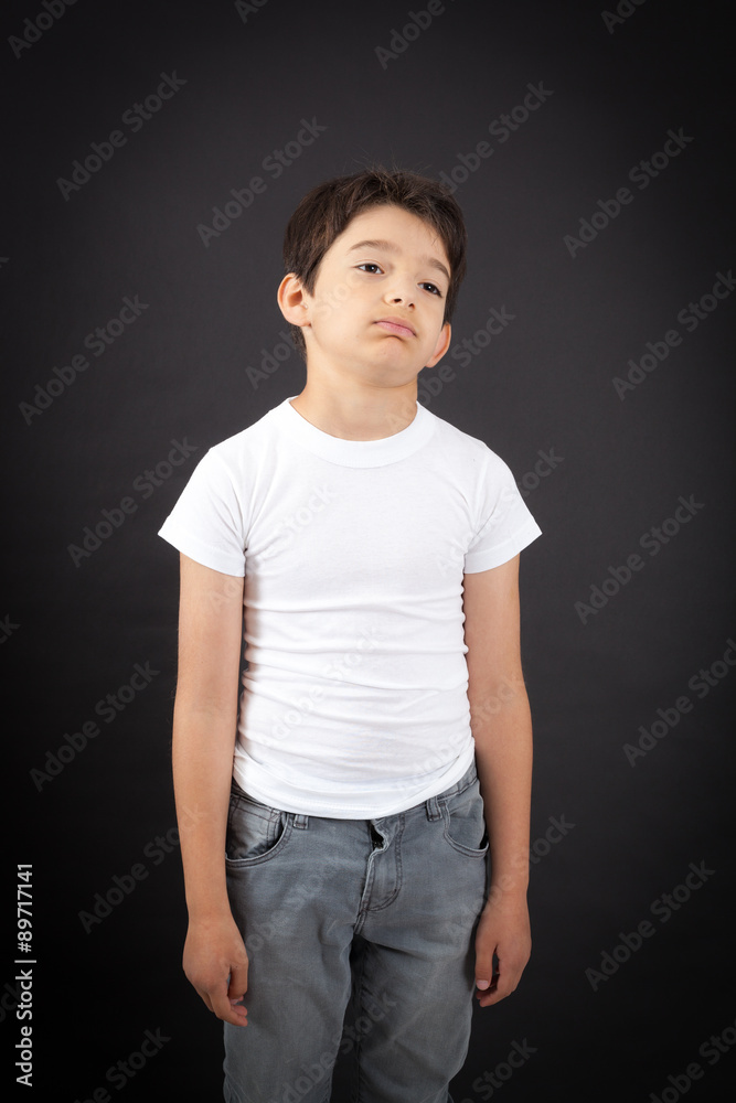 Handsome boy doing different expressions in different sets of clothes: bored Handsome boy doing different expressions in different sets of clothes: bored