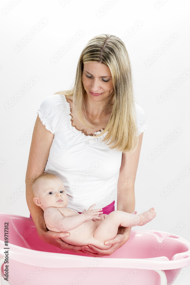 portrait of mother with her baby during bathing portrait of mother with her baby during bathing
