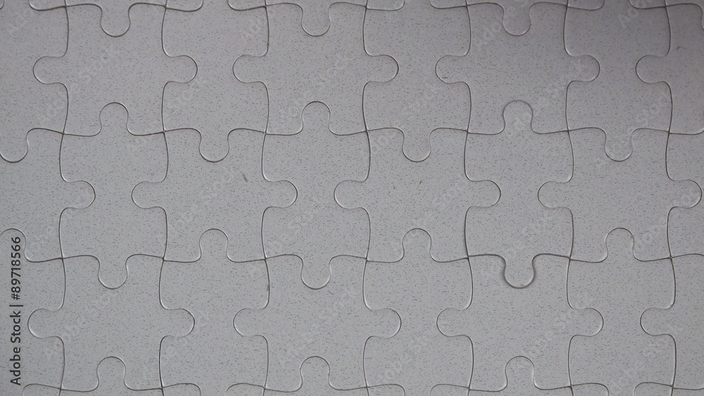 Male hand putting a missing piece and solving blank white jigsaw puzzle, 4k uhd footage, 2160p, 3840x2160 Male hand putting a missing piece and solving blank white jigsaw puzzle, 4k uhd footage, 2160p, 3840x2160