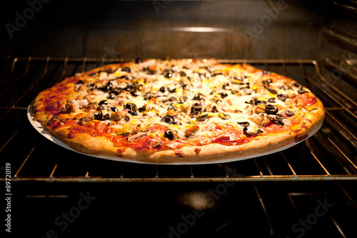 baking pizza in electric oven