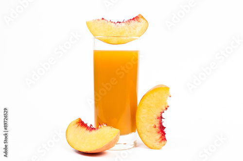 Peach juice on a white background.