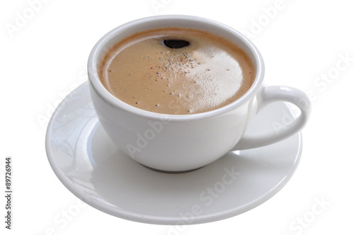 Black coffee in a classic porcelain espresso cup, delicate brown froth still there. Isolated on white.