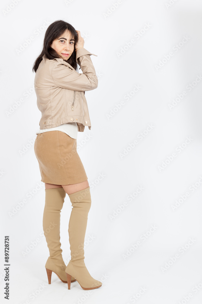 Beautiful woman doing different expressions in different sets of clothes: posing Beautiful woman doing different expressions in different sets of clothes: posing