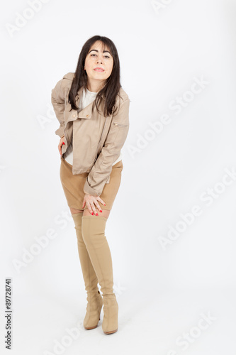 Beautiful woman doing different expressions in different sets of clothes: posing © chris_b_paris