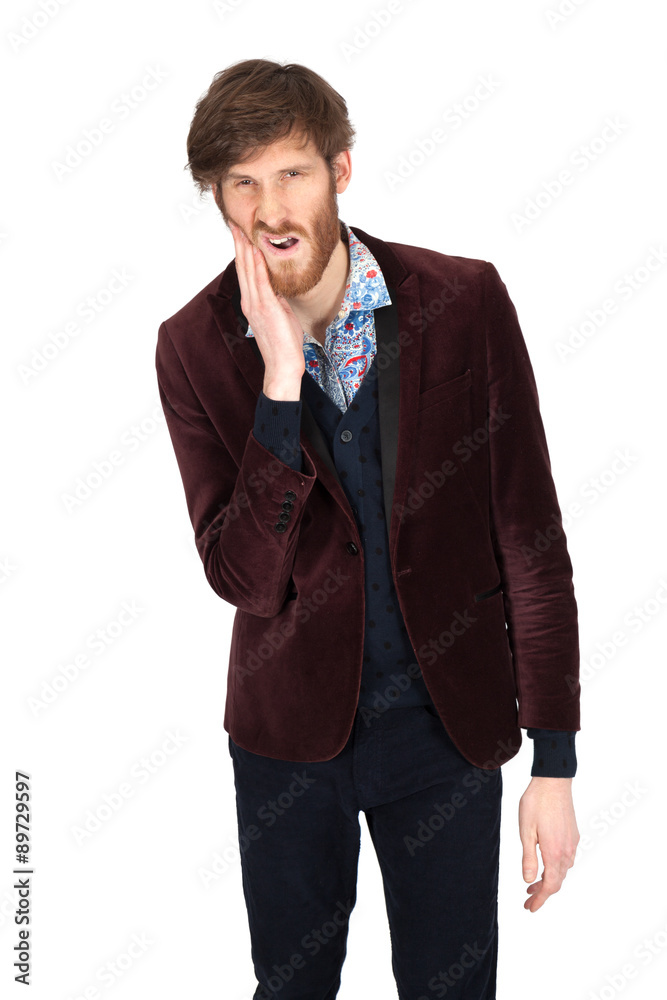 Handsome man doing different expressions in different sets of clothes: toothache