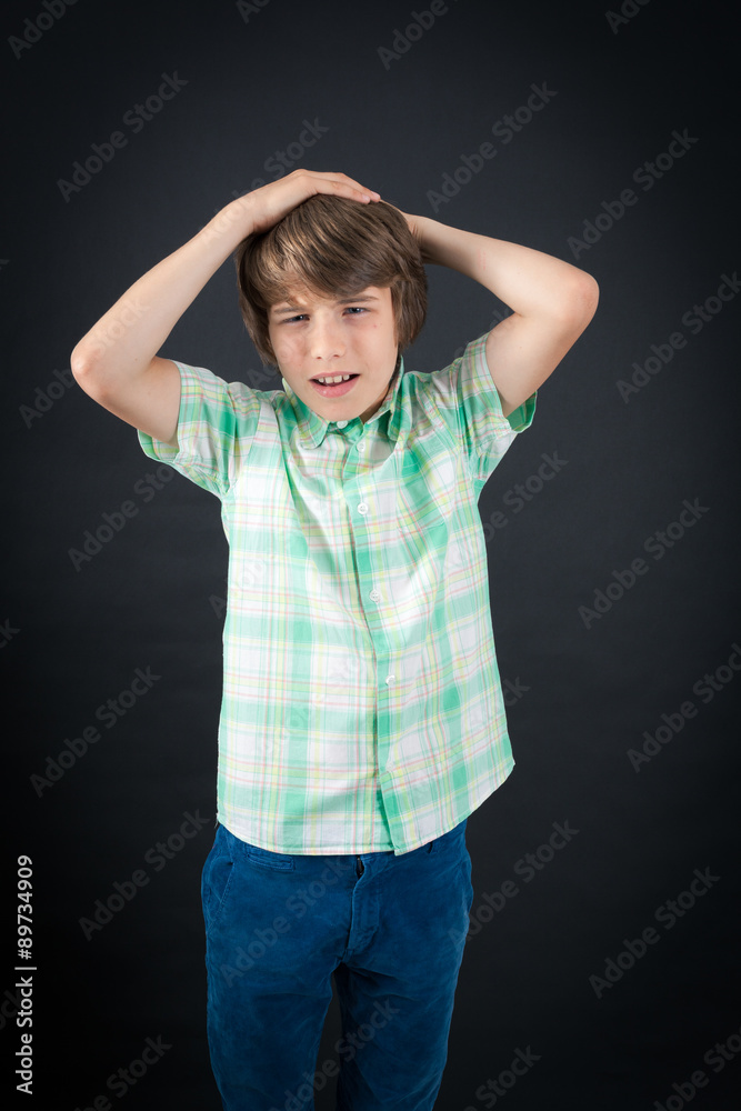 Handsome boy doing different expressions in different sets of clothes: headache Handsome boy doing different expressions in different sets of clothes: headache