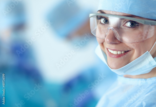 Young surgery team in the operating room photo