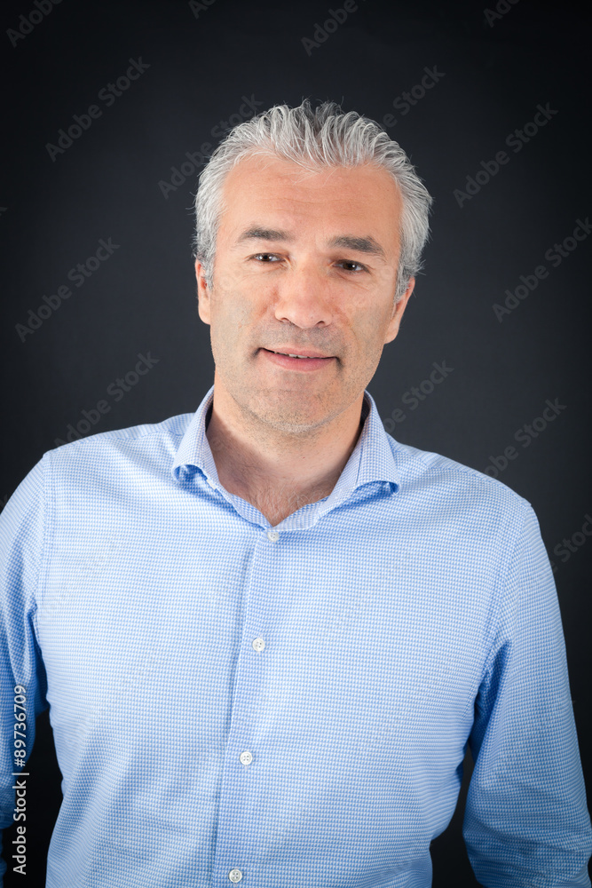 Handsome man doing different expressions in different sets of clothes: smile Handsome man doing different expressions in different sets of clothes: smile