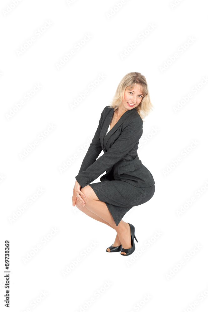 Beautiful businesswoman doing different expressions in different sets of clothes: posing Beautiful businesswoman doing different expressions in different sets of clothes: posing