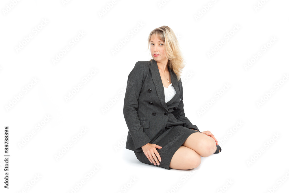 Beautiful businesswoman doing different expressions in different sets of clothes: posing Beautiful businesswoman doing different expressions in different sets of clothes: posing