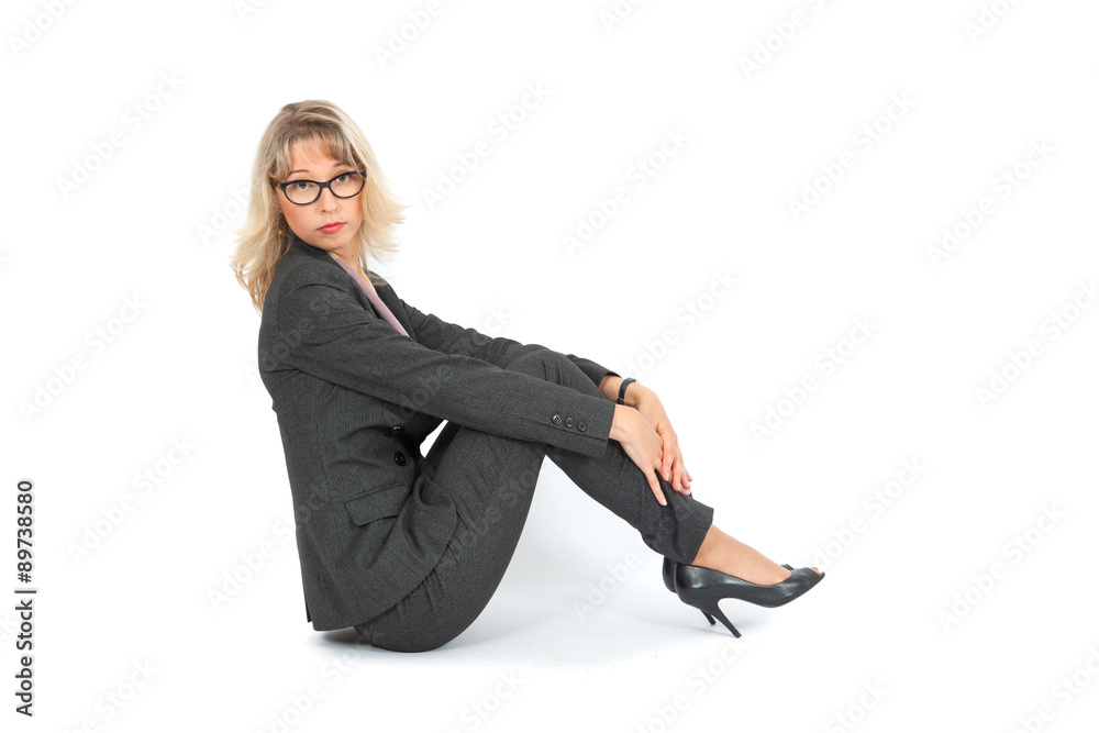 Beautiful businesswoman doing different expressions in different sets of clothes: posing Beautiful businesswoman doing different expressions in different sets of clothes: posing