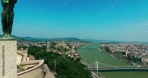 Hungary. Budapest bird eye view. Liberty Statue Buda aerial view moving up camera. Travel tourism Landmark Buda and Pest panoramic view.