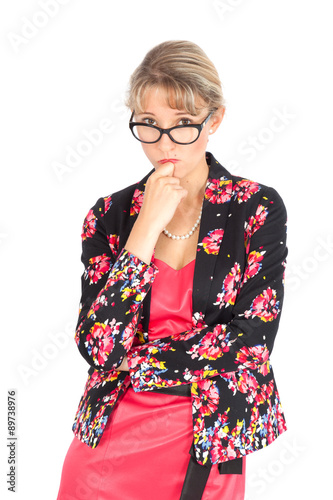 Beautiful businesswoman doing different expressions in different sets of clothes: suspicion