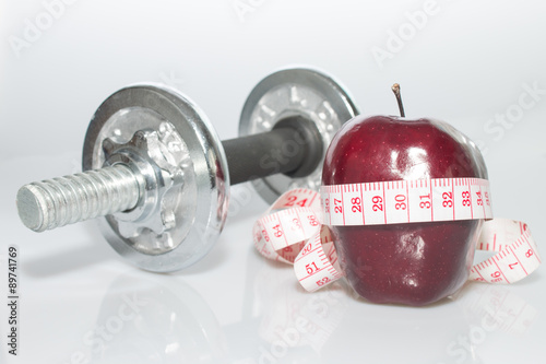 Red apple and dumbbells