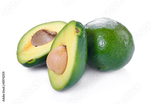 green avocados isolated on the white background