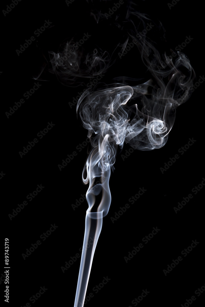 gray smoke on a black background. gray smoke on a black background.