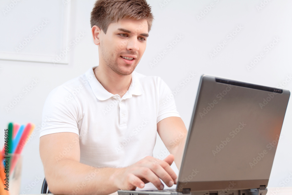Student working on laptop Student working on laptop