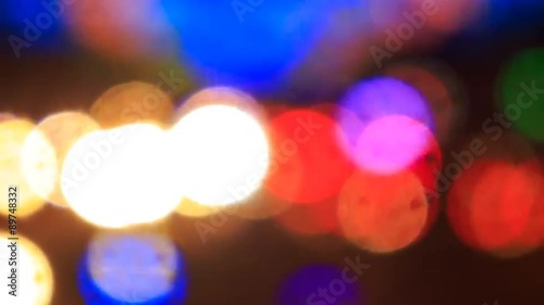 view of bright colourful defocused lights of city illumination