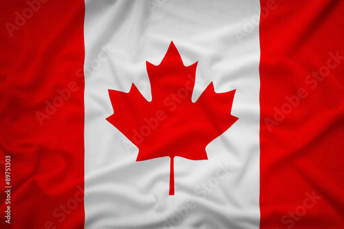 Canada flag on the fabric texture background,Vintage style