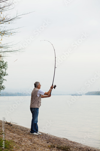 Fisherman casting a hook